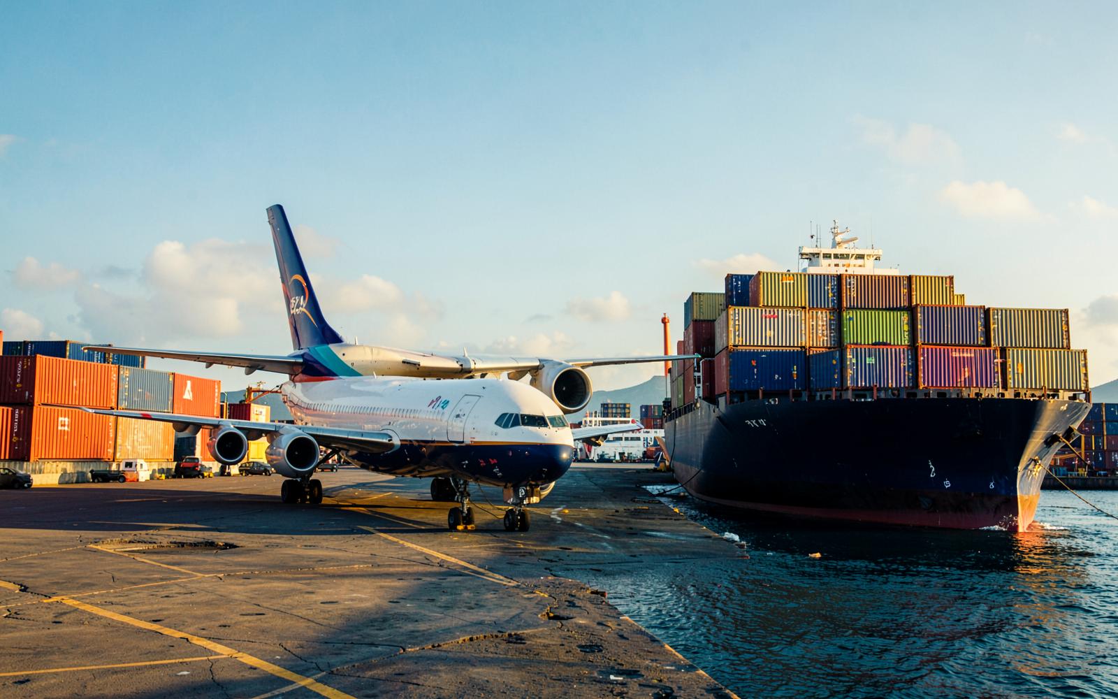 Cargo aircraft and container ship at a Caribbean port